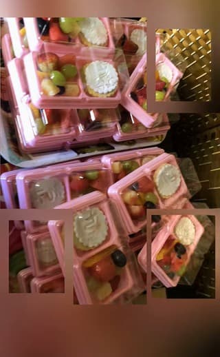 Fruit trays in pink boxes
